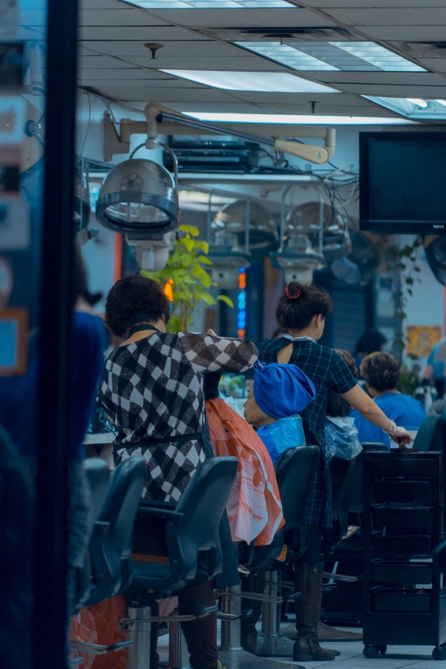 hair salon, chinatown, haircut, rainy day, stret photography, blue tones, orange tones, color balance, nyc, new york city, manhattan,